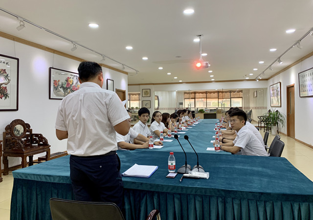 The semi-annual sales department meeting